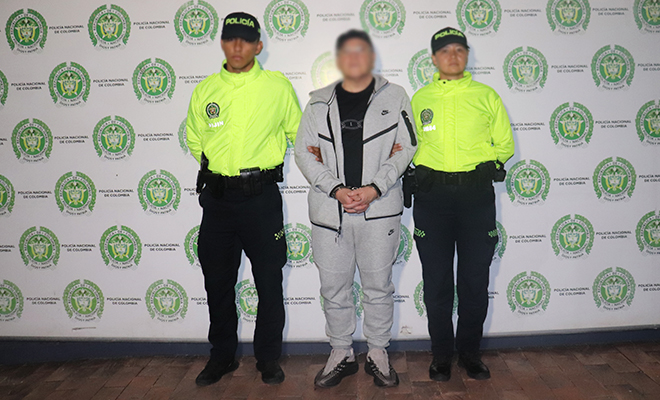 El capturado alias 'Don Hugo' es custodiado por parte de la Polic&iacute;a Nacional.