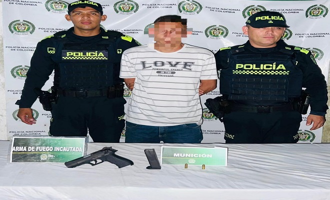Policia y capturado