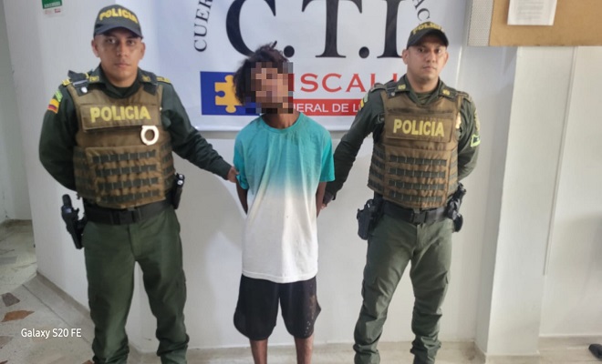 Policia y capturado