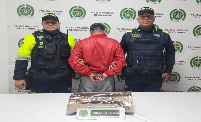 capturado y arma de fuego incautada y la patrulla policial