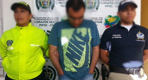 policia-captura-milñ caras